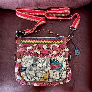 Sakroots Peace Purse and Wallet Set.
